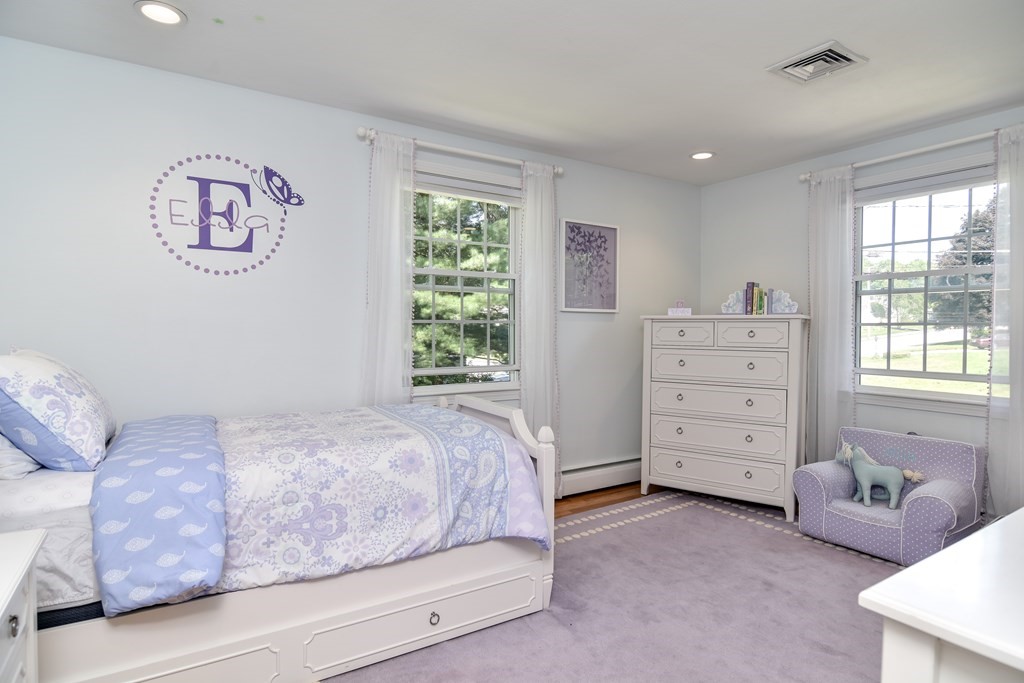 9 Longmeadow Road Medfield, MA 02052 - Photo 15 of 31 a bedroom with a bed and a window