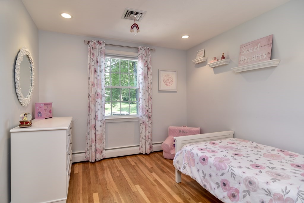 9 Longmeadow Road Medfield, MA 02052 - Photo 16 of 31 a bedroom with a bed and a window