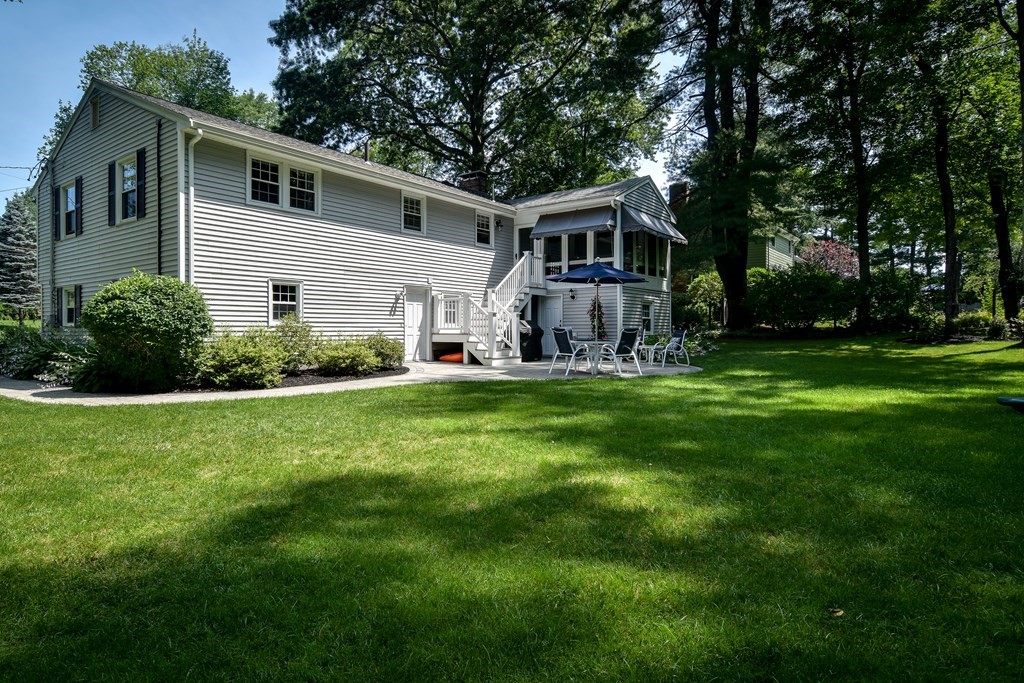 9 Longmeadow Road Medfield, MA 02052 - Photo 31 of 31 a front view of house with yard and green space