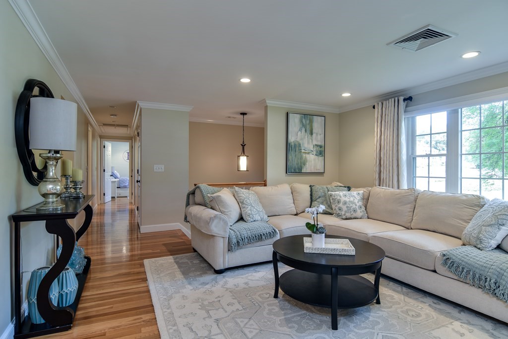 9 Longmeadow Road Medfield, MA 02052 - Photo 6 of 31 a living room with furniture a rug a lamp and a window