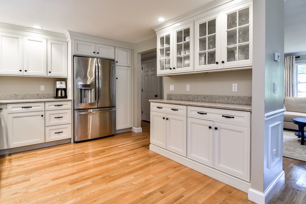 9 Longmeadow Road Medfield, MA 02052 - Photo 10 of 31 a kitchen with stainless steel appliances a refrigerator sink and cabinets