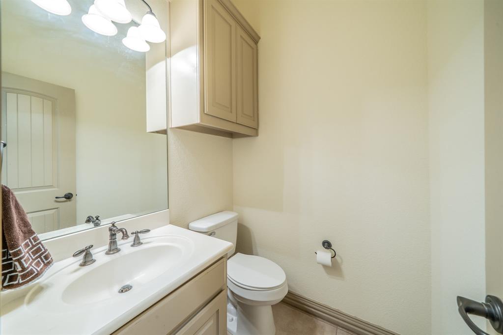 109 Overton Ridge Circle Weatherford, TX 76088 - Photo 20 of 27 Half bath with storage.