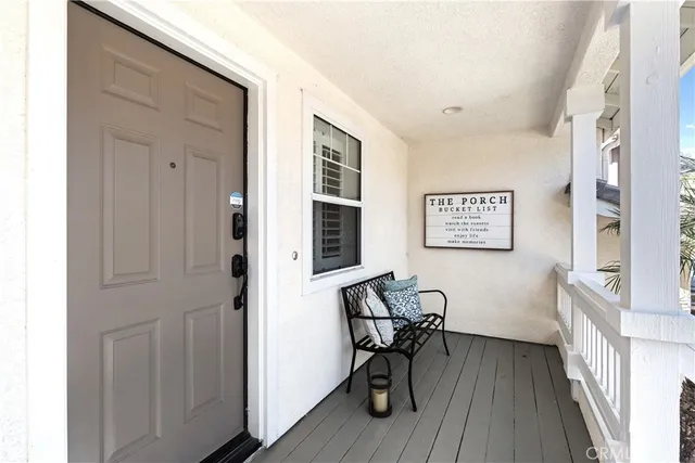 a view of a livingroom with furniture and wooden floor