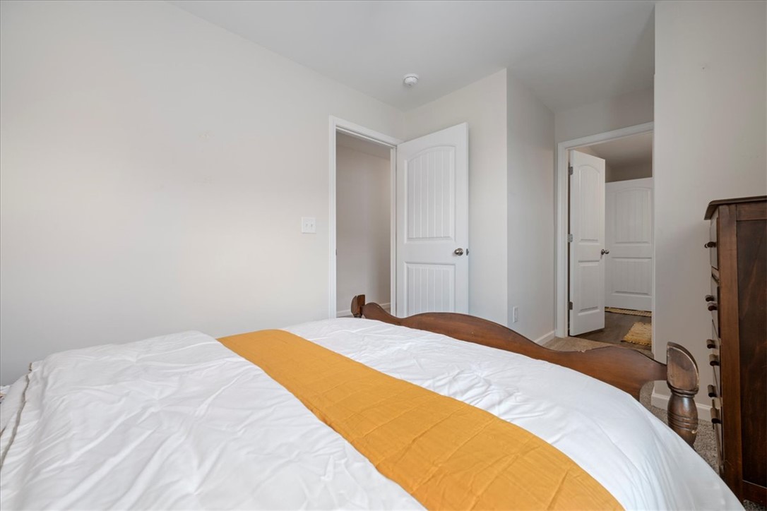 117 Adger Road Pendleton, SC 29670 - Photo 21 of 36 This cozy room offers a serene atmosphere and soft lighting, ideal for peaceful slumber.