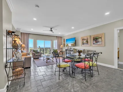 a kitchen with stainless steel appliances granite countertop a refrigerator sink stove microwave and cabinets