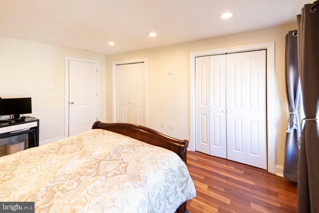 2107 Carpenter Street Philadelphia, PA 19146 - Photo 11 of 24 a bedroom with a bed and a flat screen tv