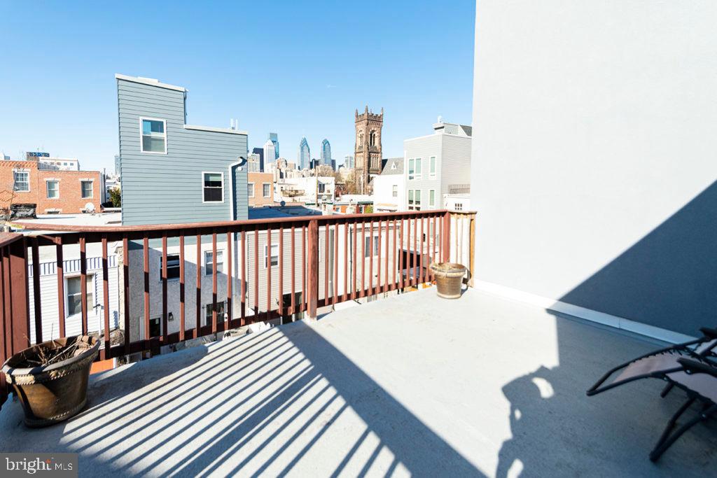 2107 Carpenter Street Philadelphia, PA 19146 - Photo 23 of 24 a view of balcony with wooden floor