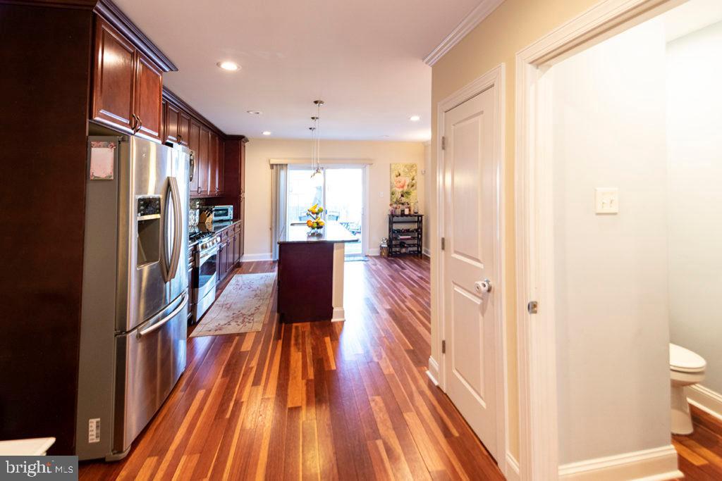 2107 Carpenter Street Philadelphia, PA 19146 - Photo 4 of 24 a view of a hallway with wooden floor and staircase