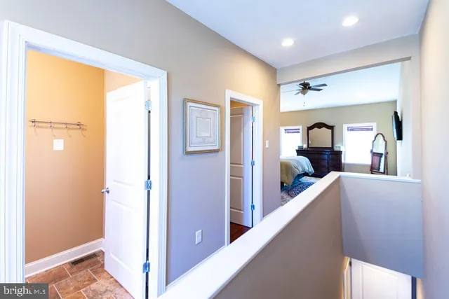 a view of gallery with wooden floor