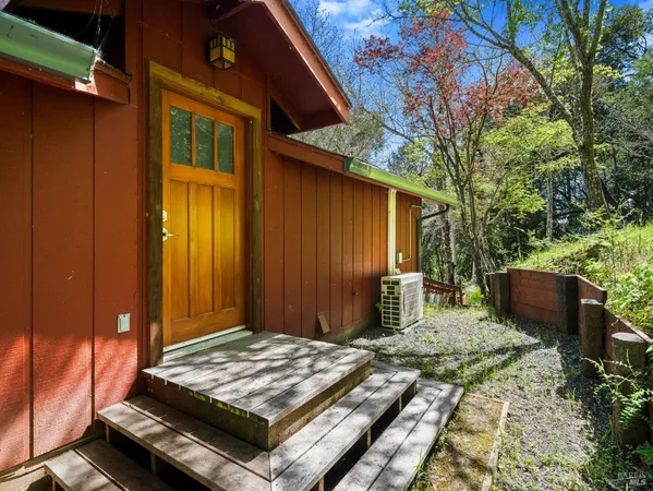 a house view with a backyard space