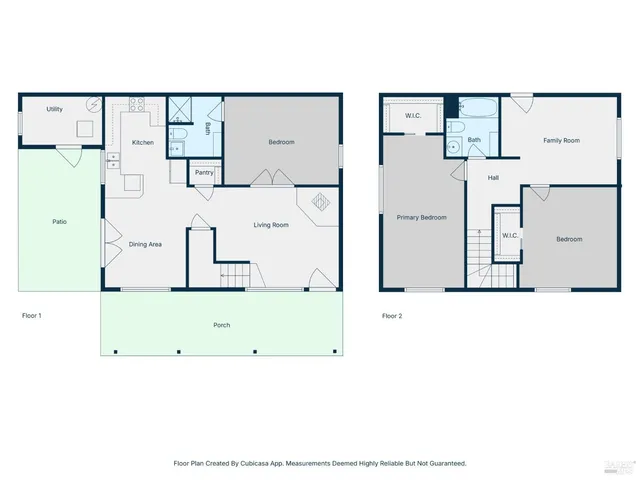 a black white and white photo of a living room