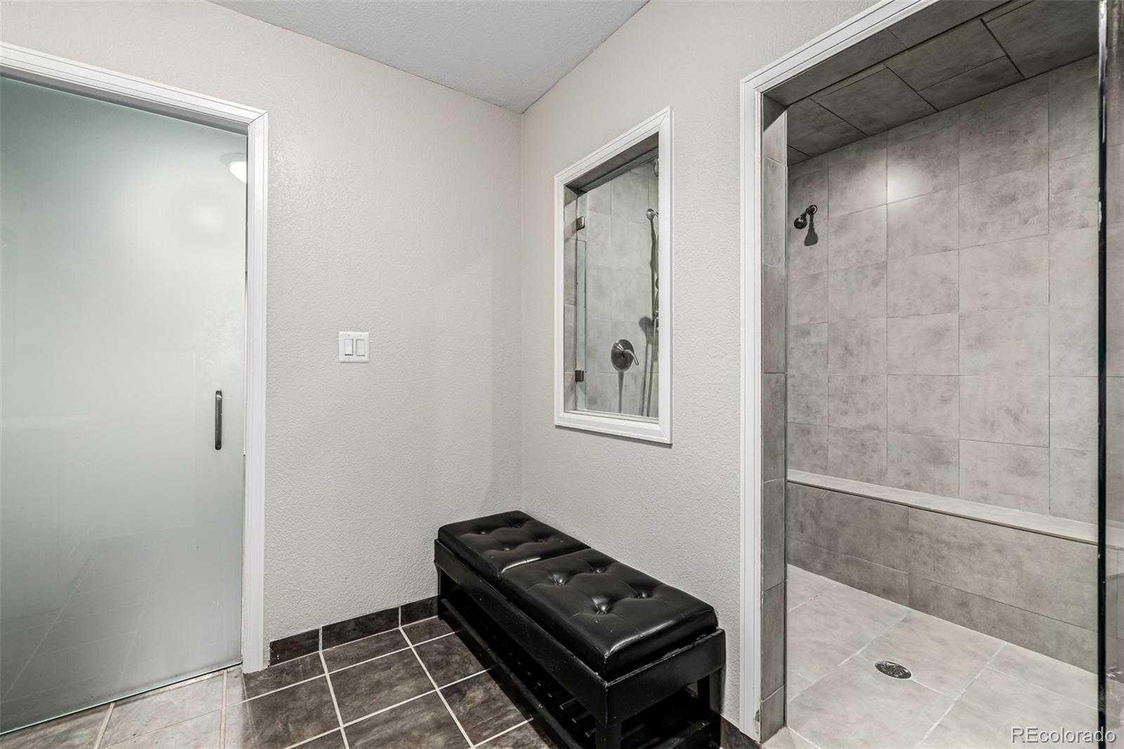 15501 East 112th Avenue, Unit 34C Commerce City, CO 80022 - Photo 16 of 18 a room that has a bed and a mirror in it