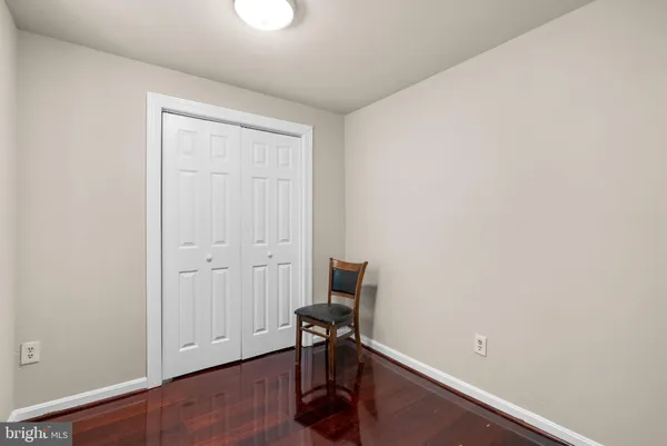 a view of workspace with hardwood wall