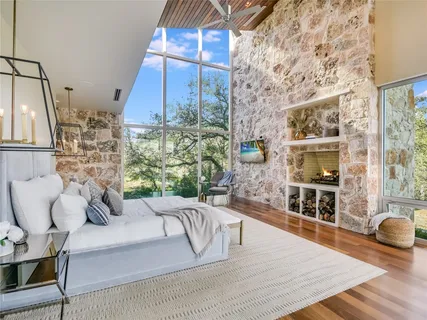 a kitchen with kitchen island granite countertop a sink and stove