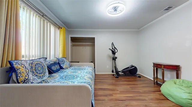 a living room with furniture rug and a large window