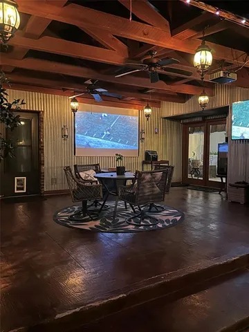 a view of a building with sitting area