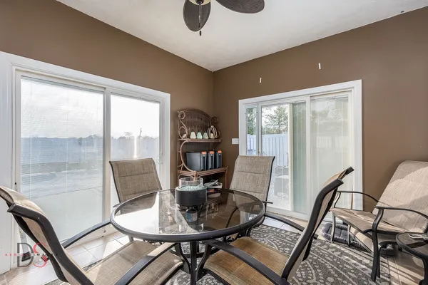 a work room with furniture and a window