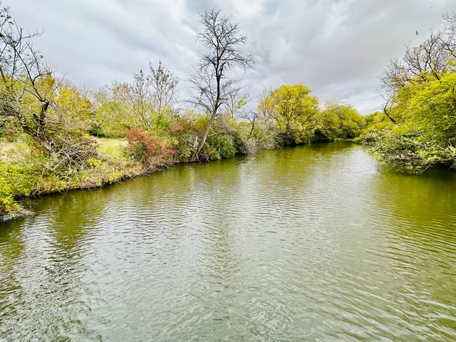 a view of an ocean with boats