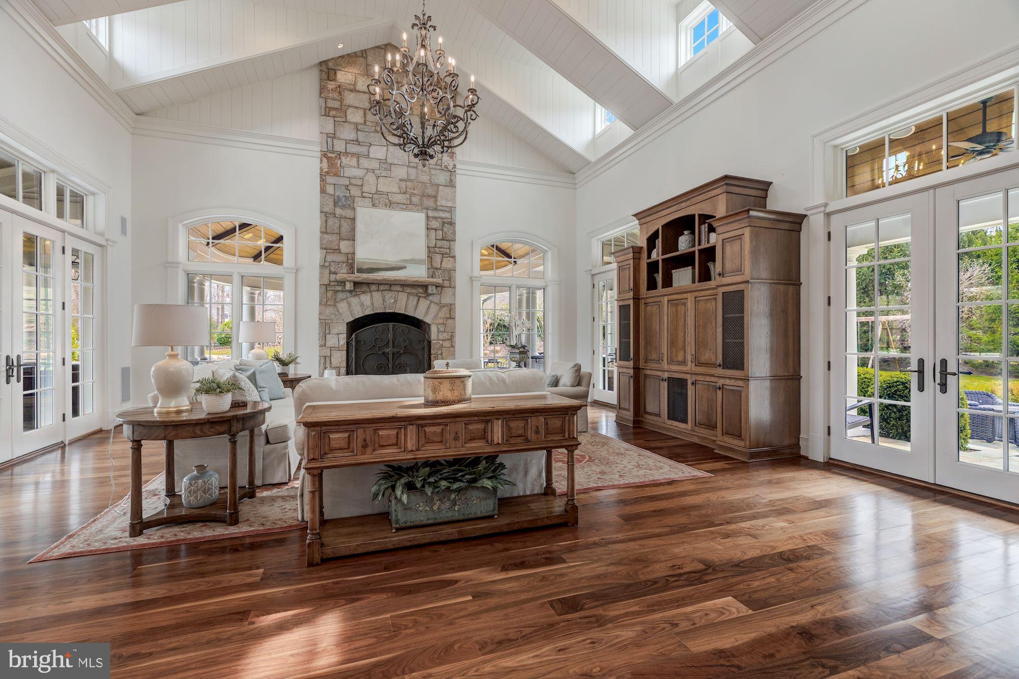 733 Springvale Road Great Falls, VA 22066 - Photo 17 of 74 Floor-ceiling stone FP, multiple French doors