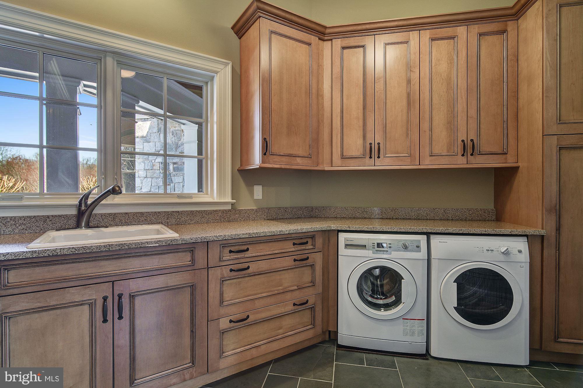 733 Springvale Road Great Falls, VA 22066 - Photo 29 of 74 refrigerator, washer, dryer, extensive cabinetry