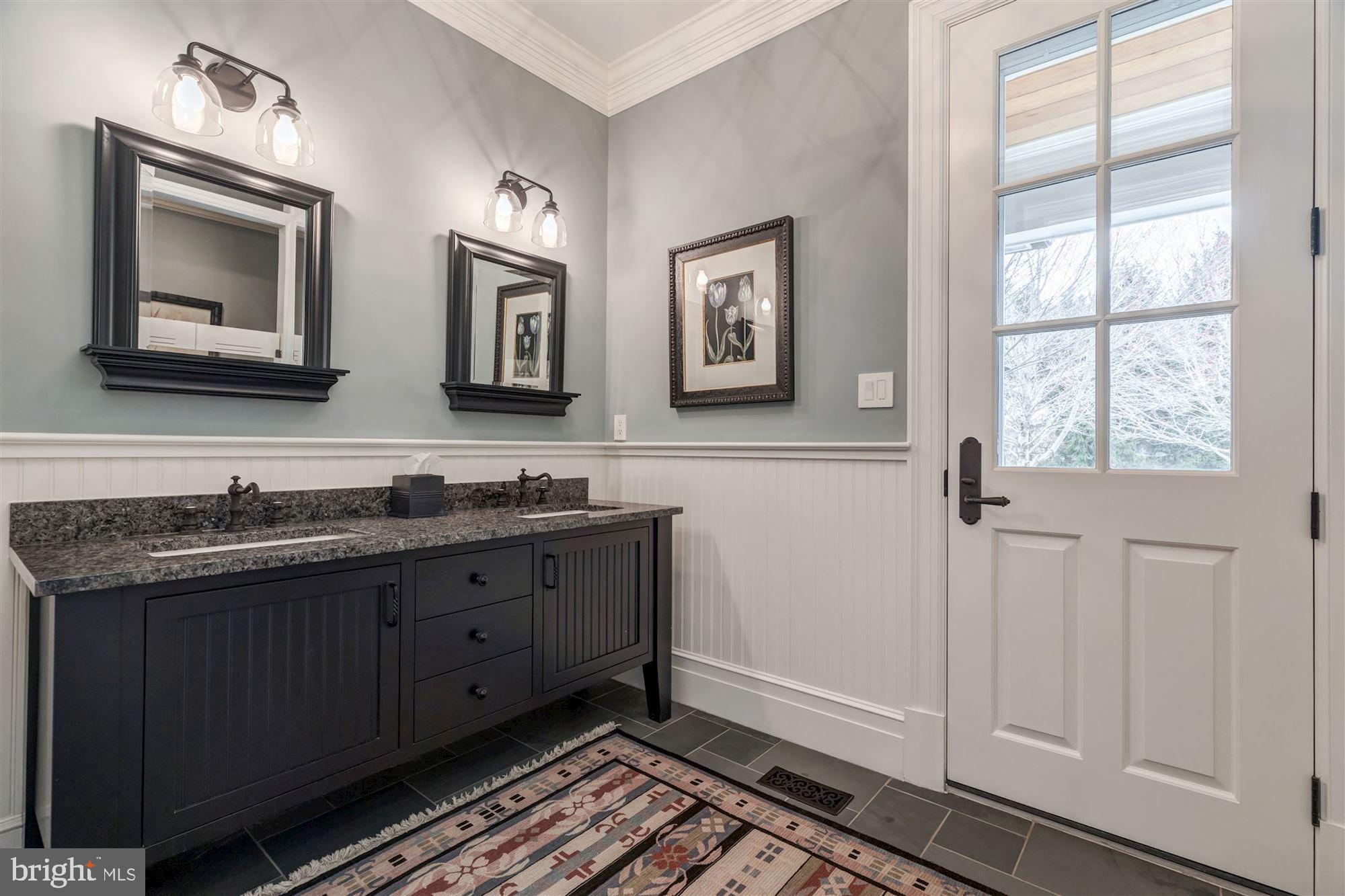 733 Springvale Road Great Falls, VA 22066 - Photo 30 of 74 Pool Bath wi/ louvered saloon doors