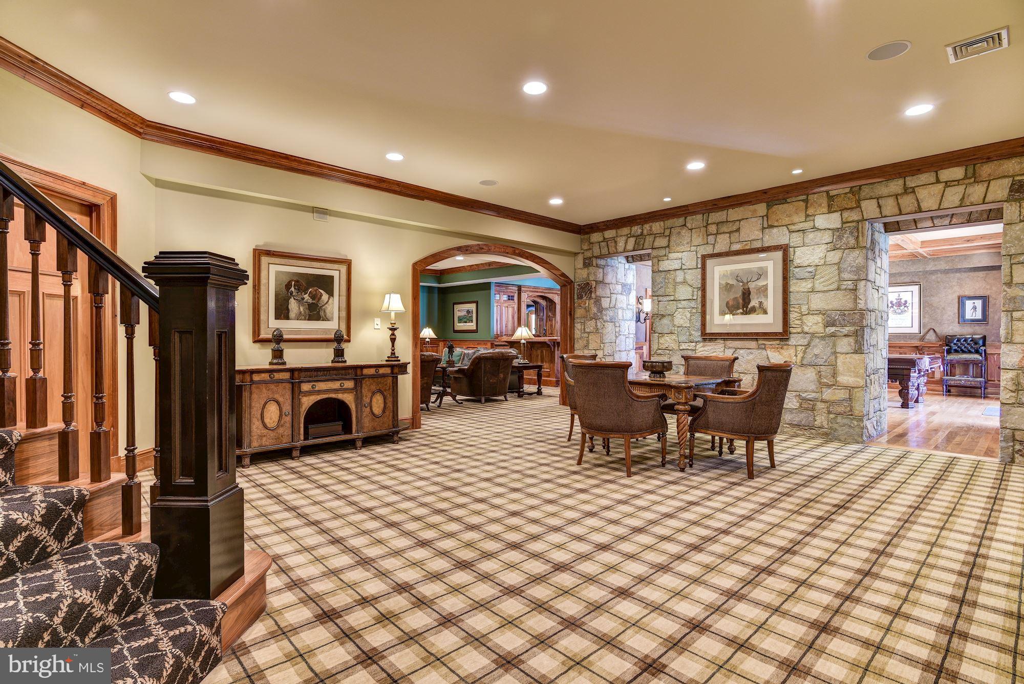 733 Springvale Road Great Falls, VA 22066 - Photo 47 of 74 Large Basement with stone accent wall