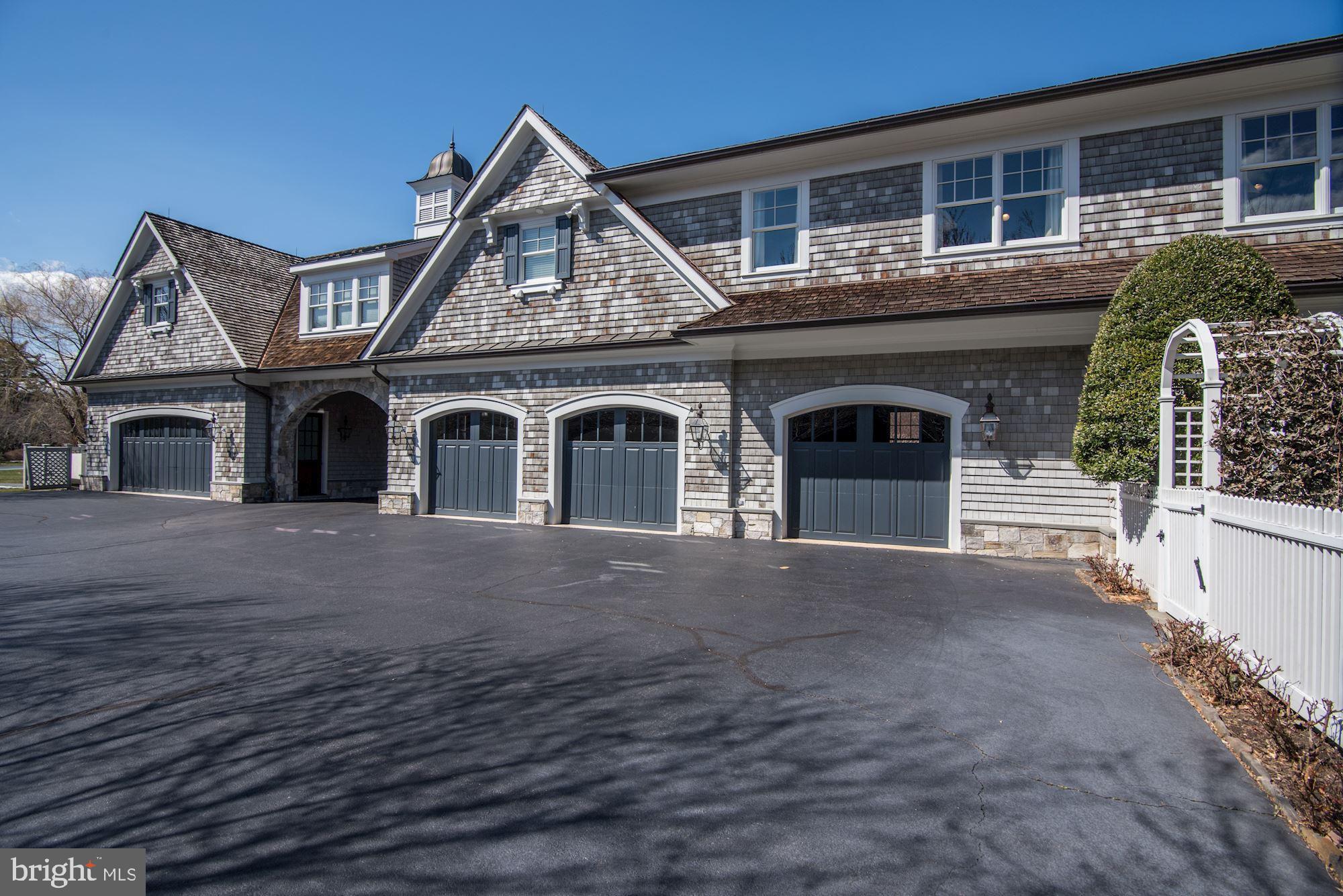 733 Springvale Road Great Falls, VA 22066 - Photo 55 of 74 Five-Car Garaging space, including Tesla charger