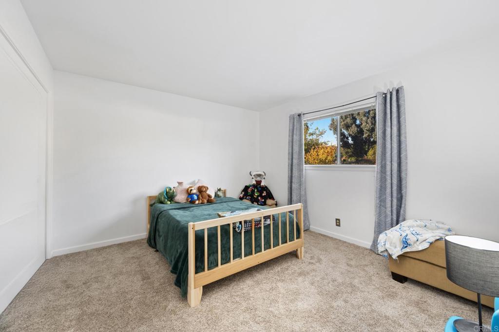 16273 Arena Drive Ramona, CA 92065 - Photo 26 of 67 a bedroom with furniture and baby crib