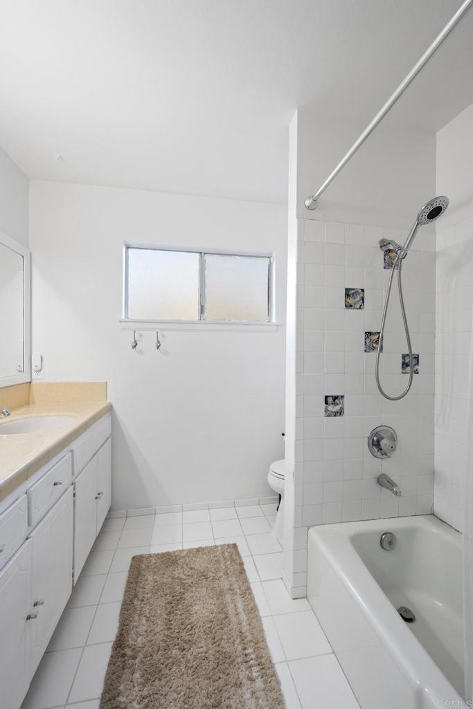 16273 Arena Drive Ramona, CA 92065 - Photo 30 of 67 a bathroom with a bathtub and toilet