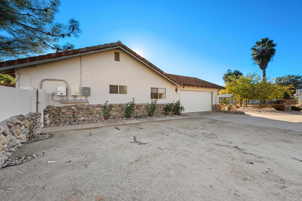 16273 Arena Drive Ramona, CA 92065 - Photo 41 of 67 a view of a house with a backyard