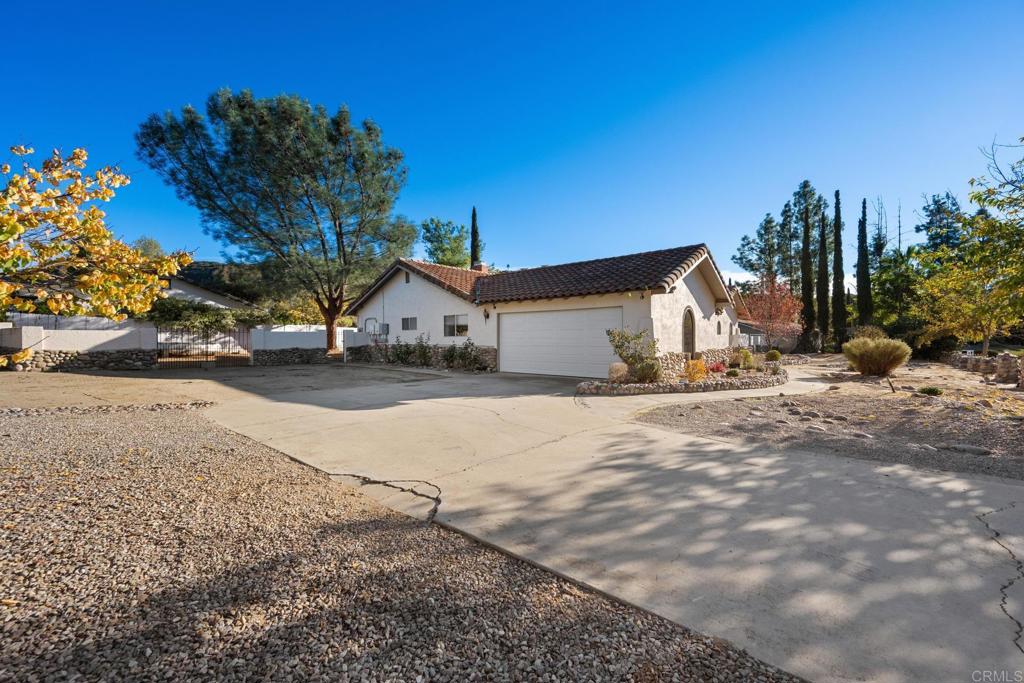 16273 Arena Drive Ramona, CA 92065 - Photo 49 of 67 a view of a house with a snow in the yard