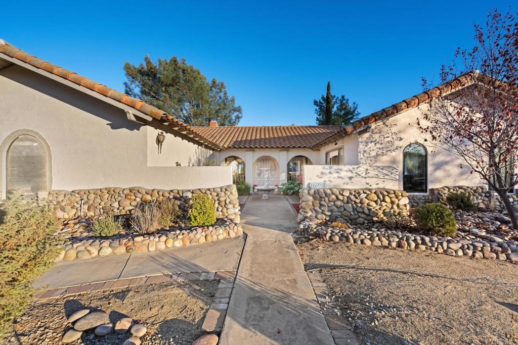 16273 Arena Drive Ramona, CA 92065 - Photo 63 of 67 a front view of a house with a yard