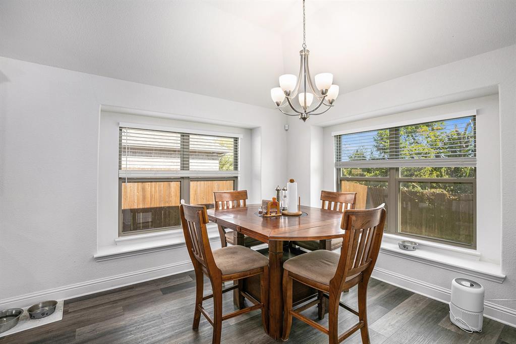 417 Elyse Road Keene, TX 76059 - Photo 11 of 34 a view of a dining room with furniture window and outside view