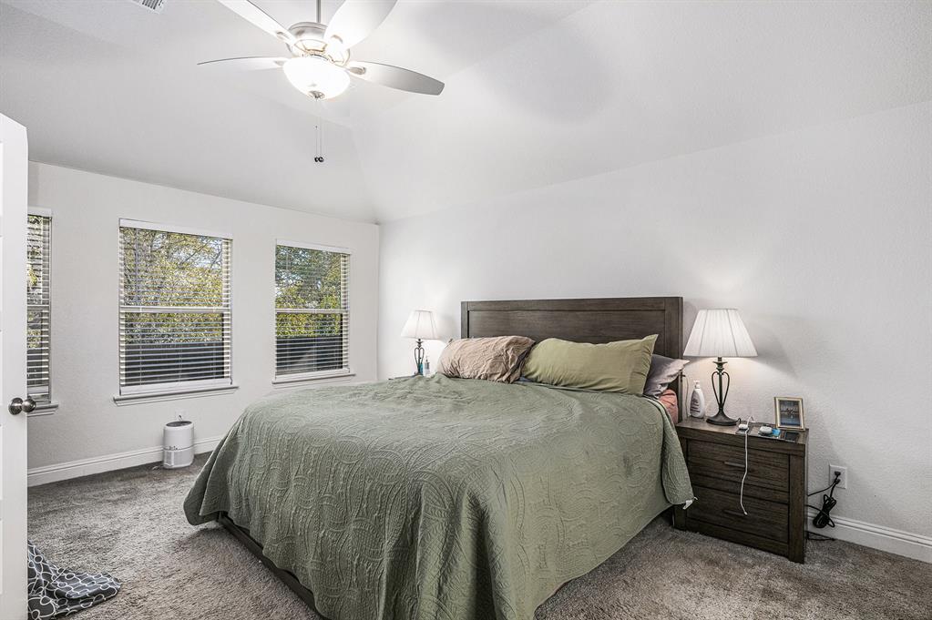 417 Elyse Road Keene, TX 76059 - Photo 18 of 34 a bedroom with a bed and window