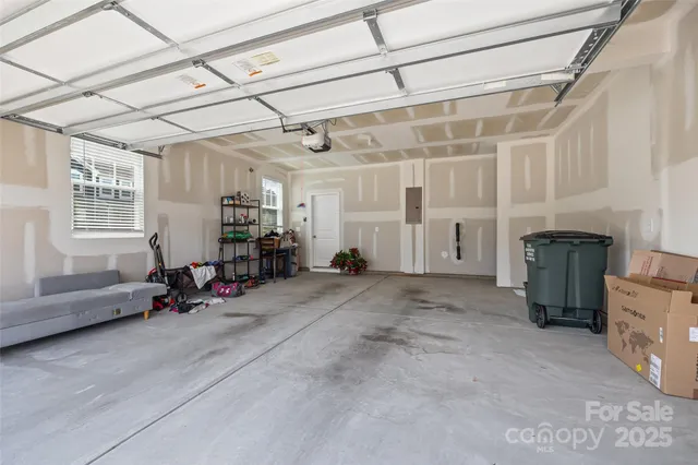 a view of a livingroom with furniture and a window