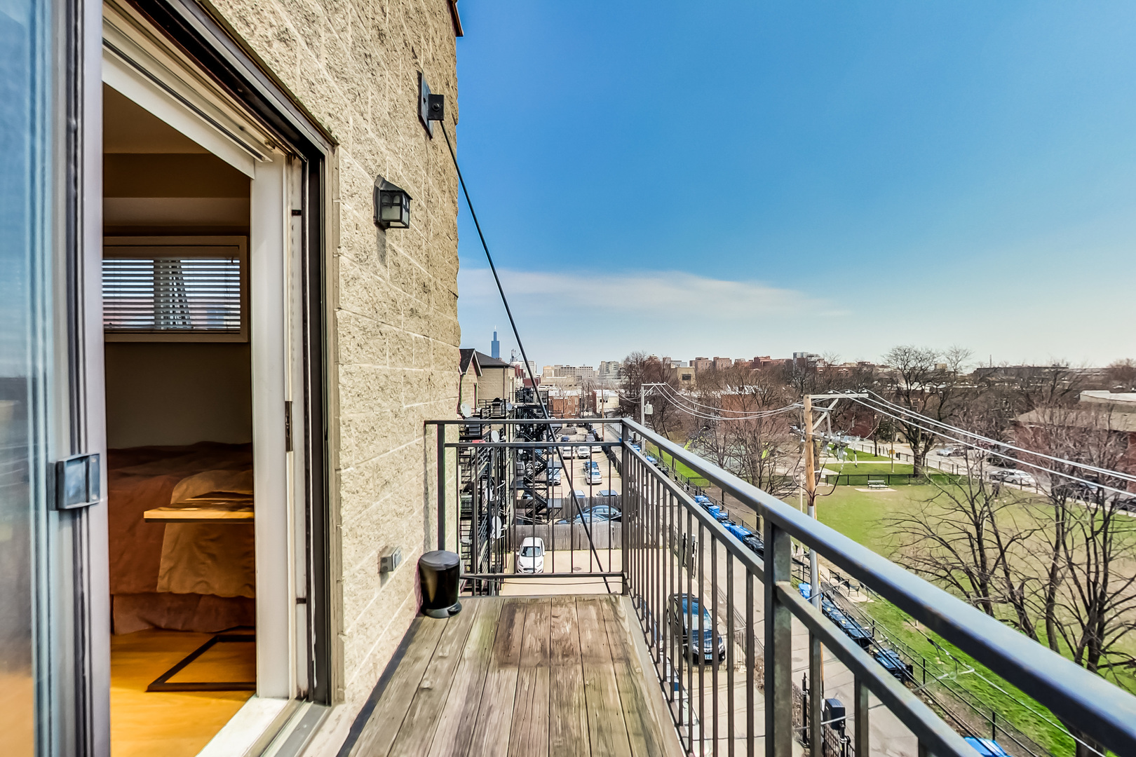 2353 West Harrison Street, Unit 4 Chicago, IL 60612 - Photo 13 of 25 a view of a balcony with city view