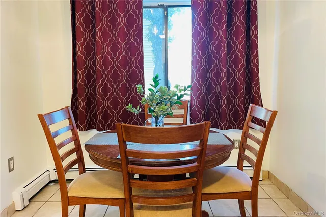 a view of chair and table in a dining room