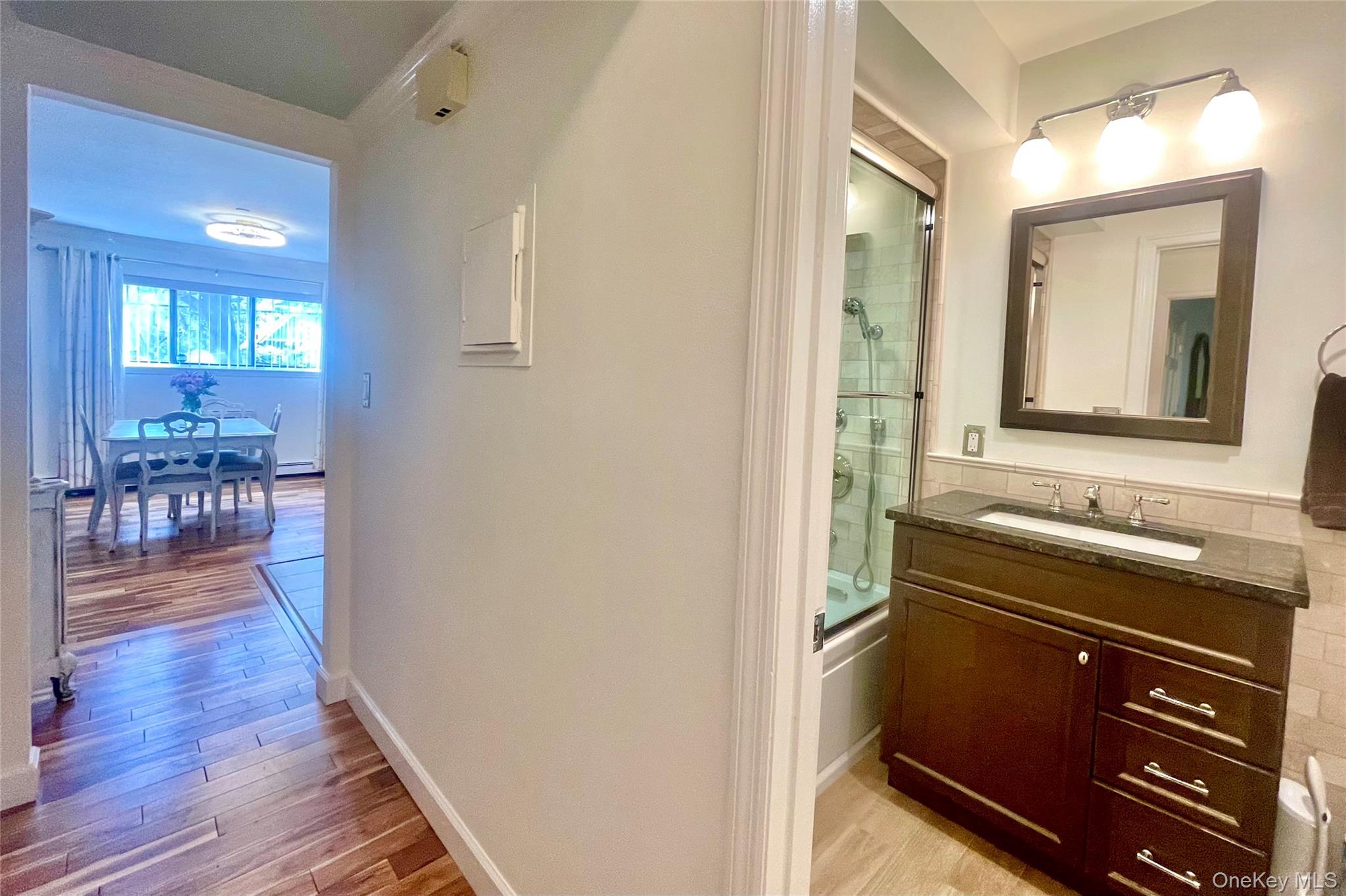 50 Dekalb Avenue, Unit S1 White Plains, NY 10605 - Photo 19 of 28 a view of a hallway and wooden floor