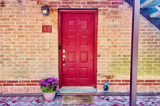 a view of a red door of the house