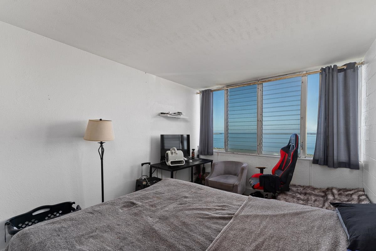 111 Kahului Beach Road, Unit A326 Kahului, HI 96732 - Photo 19 of 43 a bed room with a bed and a window