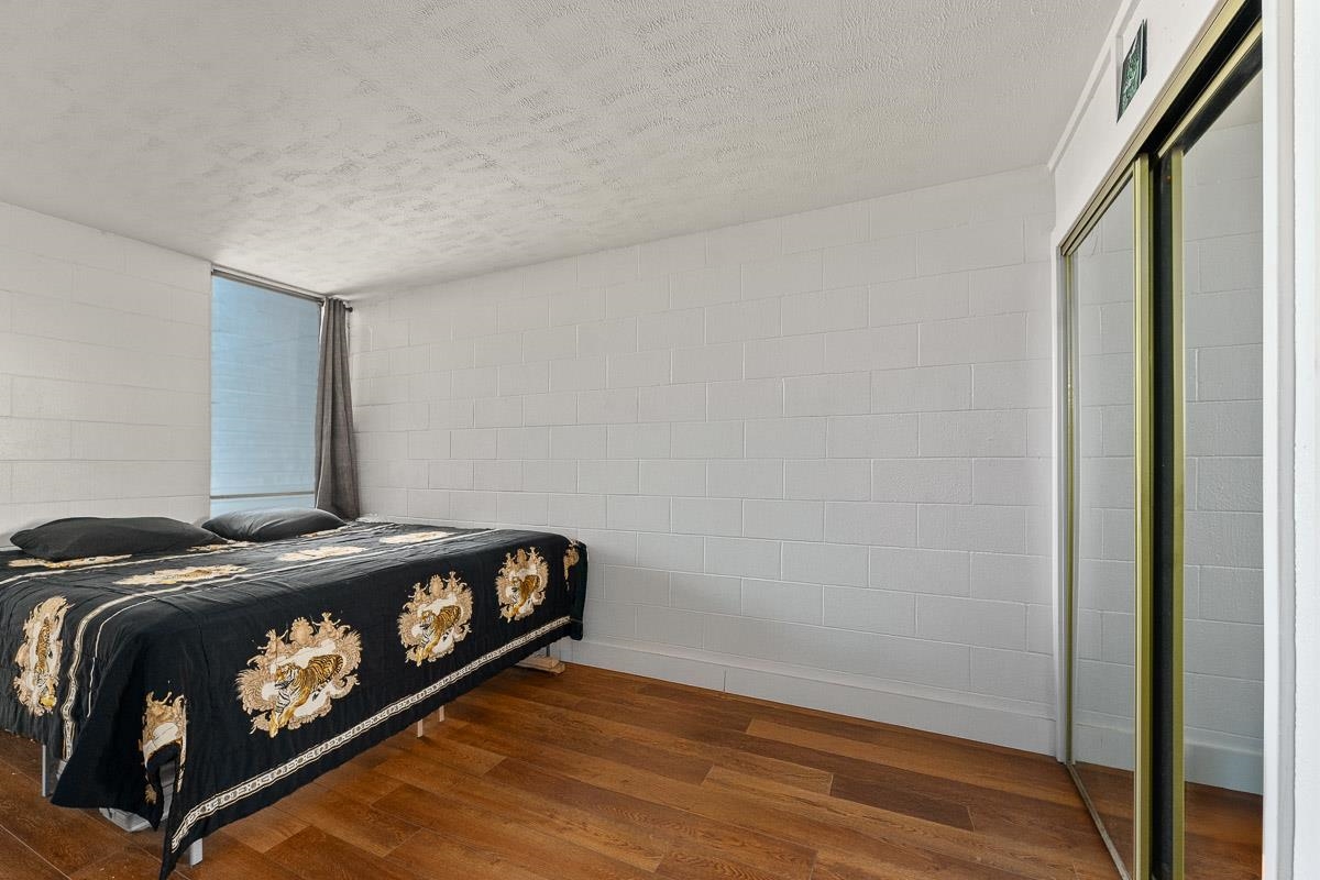 111 Kahului Beach Road, Unit A326 Kahului, HI 96732 - Photo 24 of 43 a bed sitting in a bedroom next to a window