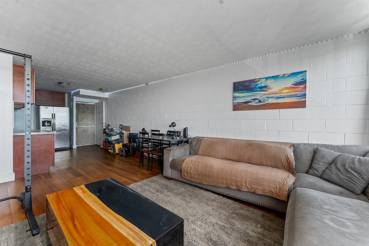 111 Kahului Beach Road, Unit A326 Kahului, HI 96732 - Photo 9 of 43 a living room with furniture and wooden floor