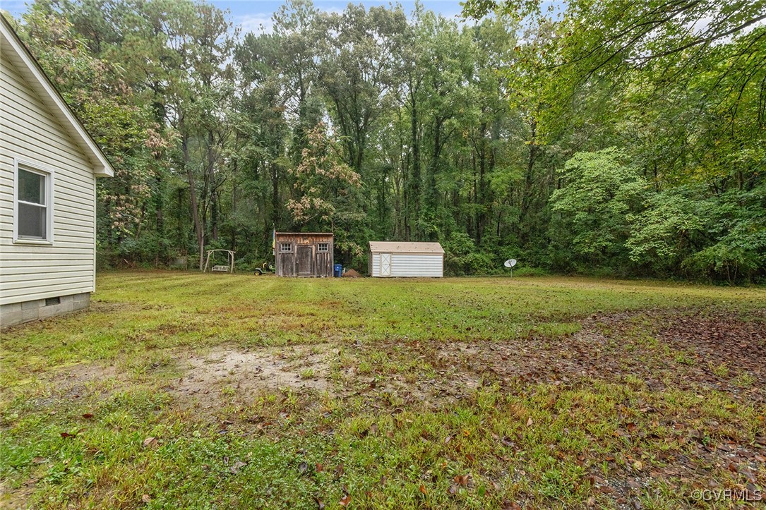 16447 Bullfield Road Doswell, VA 23047 - Photo 20 of 23 View of yard featuring a storage shed
