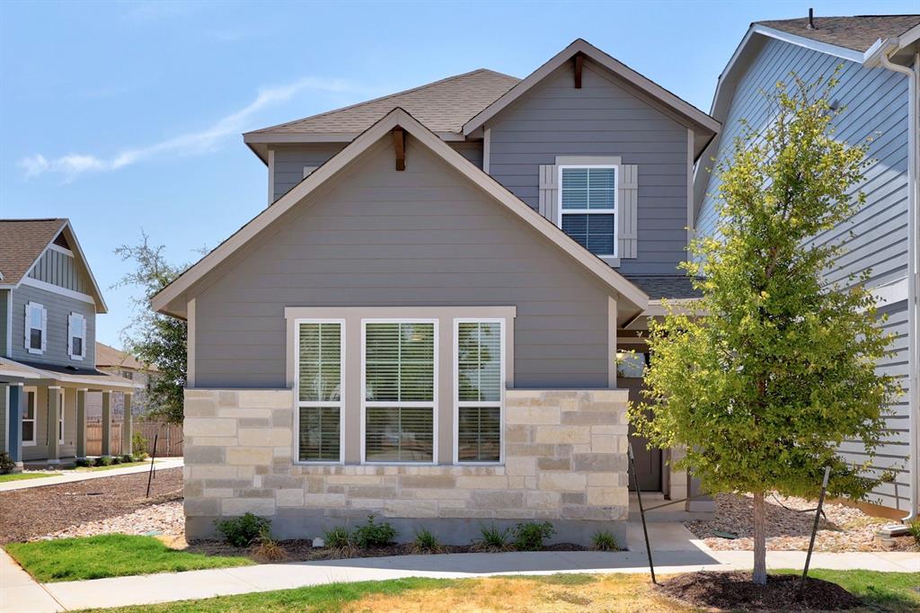 305 Toddy Way Leander, TX 78641 - Photo 1 of 1 A striking facade with stone accents and grey siding welcomes you home.