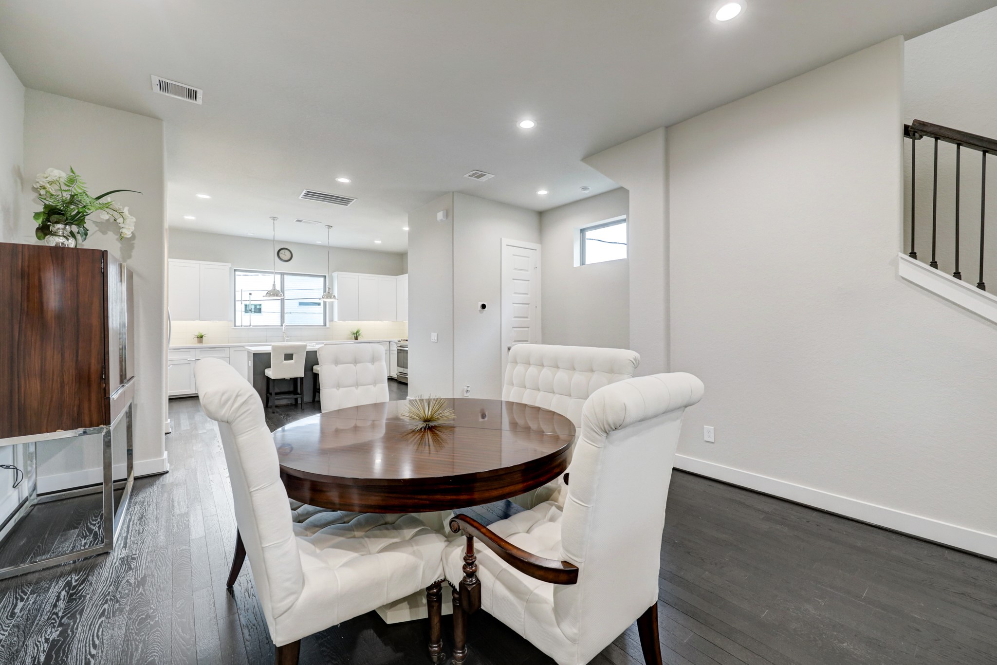 4203 Allen Street Houston, TX 77007 - Photo 13 of 35 a view of a dining room with furniture and wooden floor