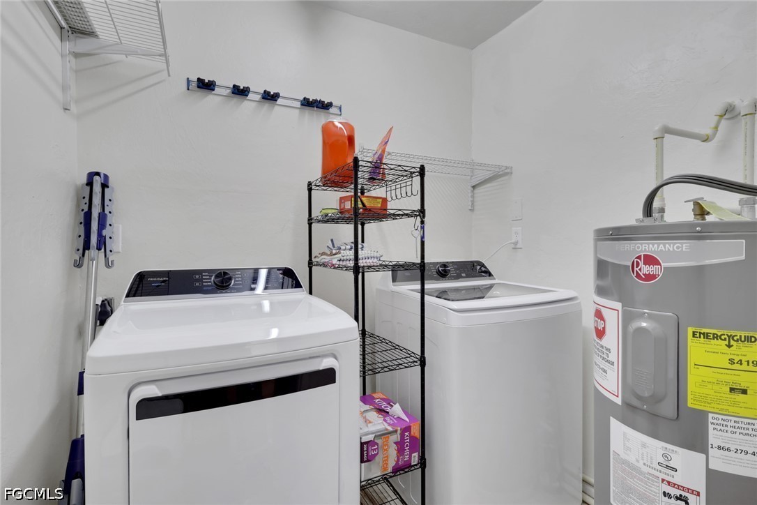 2431 Lippincott Road Alva, FL 33920 - Photo 16 of 43 a utility room with dryer and washer