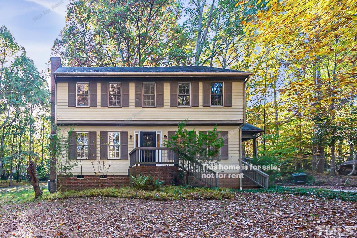 8335 Morgans Way Raleigh, NC 27613 - Photo 1 of 23 a front view of a house with garden