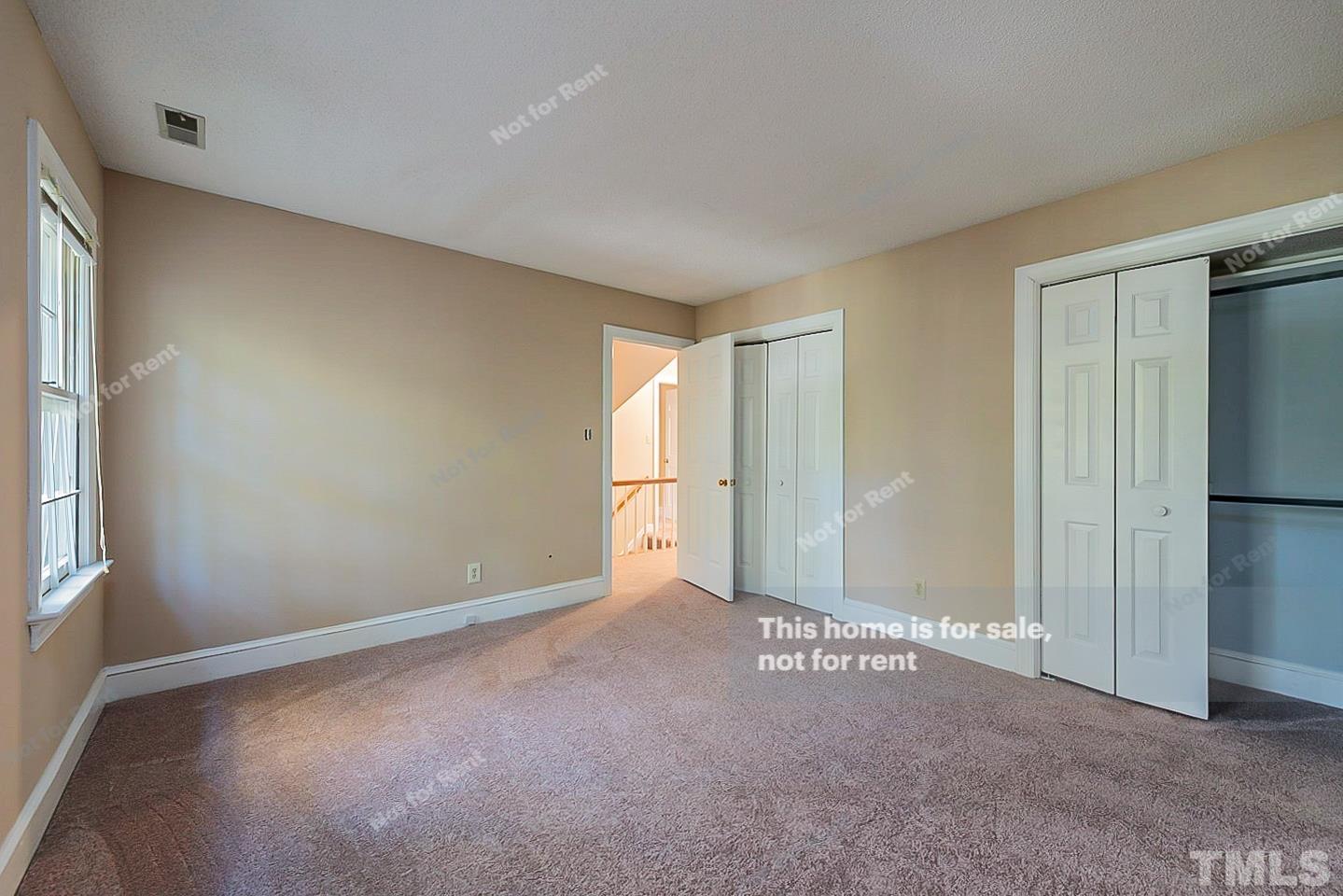 8335 Morgans Way Raleigh, NC 27613 - Photo 13 of 23 a view of an empty room with a window