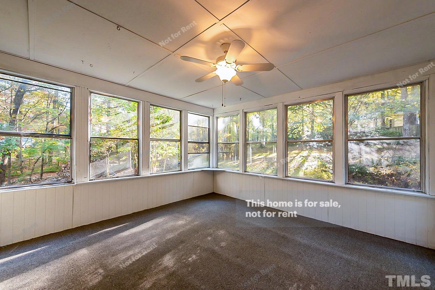 8335 Morgans Way Raleigh, NC 27613 - Photo 14 of 23 a view of an empty room with a window