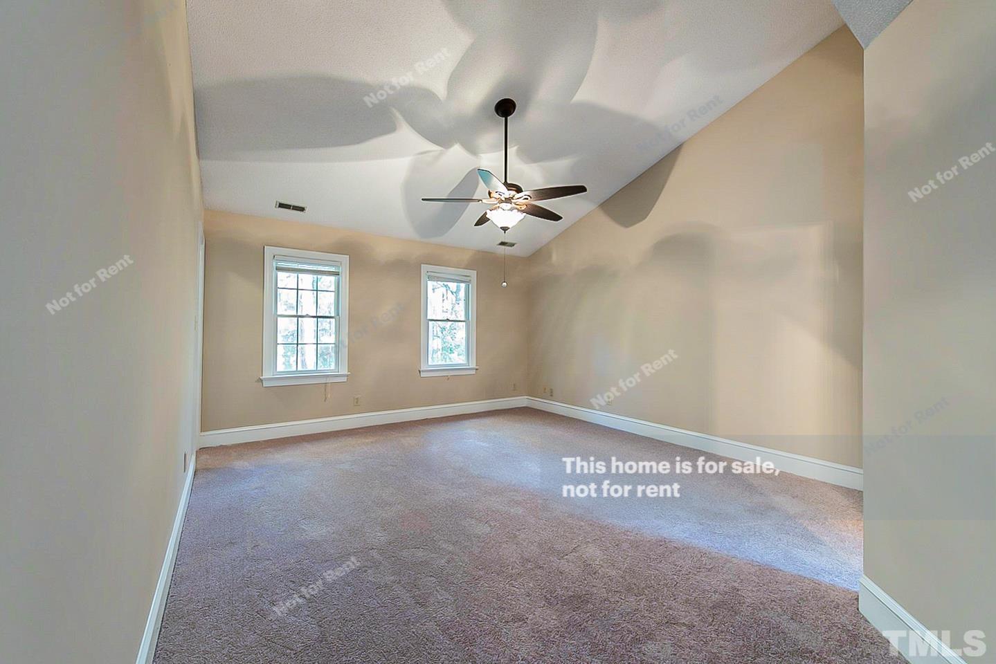 8335 Morgans Way Raleigh, NC 27613 - Photo 8 of 23 a view of an empty room with a window
